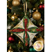A closer look at the fabrics of the ornament, showing print colors and details.