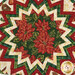 A top down shot of the table topper showing off the center fabric as well as the folded points. 