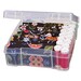Image of the 6" x 6" clear storage bin filled with precuts and threaded bobbins.