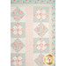 A closer look at the patchwork of the quilt, demonstrating patchwork layout and fabric details.