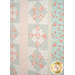 A closer look at the patchwork of the quilt, demonstrating patchwork layout and fabric details.