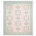 The completed Pink Diamonds quilt, colored in elegant pink, cream, and blue fabrics from the Abide collection by Moda Fabrics, isolated on a white background. 