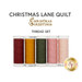 Five spools of red, ocher, green, pink, and peach threads, isolated on a white background. 