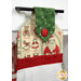 An angled close up on the top of the towel, demonstrating fabric colors on the prints and fabric button.