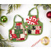 A top down shot of two of the Christmas Apron Ornaments, demonstrating details on the frontside and backside of the projects.