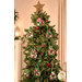 The completed Christmas Apron Ornaments, staged on a decorated Christmas Tree in a warm corner of a home.