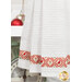 A super close up on the bottom of the towel, showing details on the towel texture and the fabric stripe.