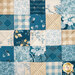 A top down shot of the hot pad, showing patchwork details on the blue and cream fabrics.