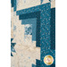 A super close up on one of the log cabin blocks, demonstrating fabric print and color details.