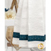 A super close up on the bottom of the towel, showing details on the towel texture and the fabric stripe.