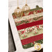 The completed Dry Ideas drying mat, colored in red, green, cream, and gold metallic fabrics from the Poinsettias at Christmas collection by Jennifer Bosworth for Riley Blake Designs, staged on a white marble kitchen counter with coordinating decor.