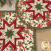 A closer look at the two Folded Star Hot Pads, demonstrating fabric color and print details.
