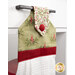 A shot of the top section of the towel taken from a slight angle, showing details on the bell fabric as well as the fabric button.