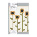 Pattern book of large yellow sunflowers with sawtooth blooms against a cream dotted background from the Scrappy Sunflowers pattern by Lella Boutique.