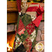 A close up of the décor-stuffed stocking, showing fabric color and print details.