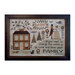 Finished Love Your Family cross stitch pattern in a wooden frame.