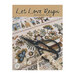 Finished Let Love Reign cross stitch pattern topped with a pair of scissors, some lace trim, and buttons.