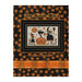 Finished pattern of The Goode Witch project in a mockup frame on a black and orange starred background.
