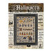 Finished Halloween Sampler cross stitch pattern full of witches, cats, and pumpkins.