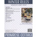 Pattern cover for “Winter Rules” by Lindsay Weight, showing Christmas village embroidery design.