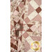 A close up on the draped quilt, showing flow and form of the quilt.