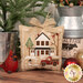 A close up on a completed ornament, featuring a red barn with green doors, surrounded by a snowman and a red truck.