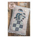 Front cover of the finished Frosty cross stitch pattern displayed on a decorative pillow against a wood plank backdrop.