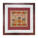Finished Pumpkin Patch pattern with three black cats playing around pumpkins bordered by a red and white dotted fabric in a white frame.
