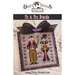 Front cover of the Mr. & Mrs. Dracula cross stitch pattern with two vampires in their aristocratic colors surrounded by hearts and bats in a black frame with a black bow on top.