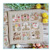 Finished The Spring Diary cross stitch pattern on a gray fabric.