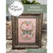 A finished and framed spring butterfly pattern with coordinating décor and a stitch count in the bottom right corner. 