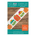 Front cover of the Pumpkins and Petals Table Runner pattern with the finished runner on a wooden plank backdrop.