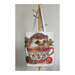 Mockup tote of the Christmas Animals Cups - Hedgehog cross stitch pattern with a hedgehog in a Christmas-inspired mug surrounded by Christmas motifs.