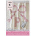 Front cover of the Bows & Monograms Quilt Pattern featuring a pink and white version of the finished quilt featuring a large bow and the letter P.