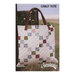 The front of the Chilly Tote pattern, showcasing the finished tote hung on a fence in a field.