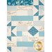A closer look at the patchwork of the quilt, showing details on the panel strips and fabric prints.
