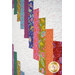 A super close up on the patchwork of the quilt, demonstrating fabric colors and print details.