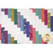 A close up on the patchwork of the quilt, demonstrating fabric colors and print details.