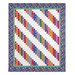 The completed 28th Floor Quilt colored in white blue, and a rainbow of fabrics from the Kipling Gardens collection by Riley Blake Designs, isolated on a white background. 