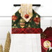 A close up on the top section of the towel, showing details on the bell fabric as well as the fabric button.