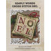 Book cover for “Simply Words Cross Stitch Dec.” showing a stitched monogram pillow with letters N, O, E, and L.
