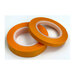 Photo of the two orange A"line"ment Tape rolls laying on a white background.