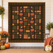 The completed Autumn Harvest Flannel Rag Quilt, colored in warm autumnal flannels from the Primo Plaids Rich & Rustic collection by Marcus Fabrics, hung on an off white shiplap wall on a sunlit porch, staged with coordinating décor and pumpkins.