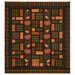 The completed Autumn Harvest Flannel Rag Quilt, colored in warm autumnal flannels from the Primo Plaids Rich & Rustic collection by Marcus Fabrics, isolated on a white background. 