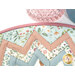 A super close up on the folded points and binding of the project, showing details on the fabric prints and colors.