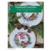A close up on one of the included projects, titled "Feathered Festivities" with birds perched amongst Christmas wreaths.