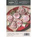 Pattern stitched holiday ornaments on a red tray with a craft pattern label.