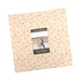 The Dear Daisy Layer Cake in its packaging, isolated on a white background. 