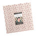 The Cardinal's Nest Layer Cake in its packaging, isolated on a white background.