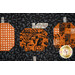 A close up on a row of patchwork pumpkins, showing fabric print and color details.